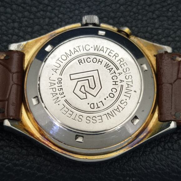 Vintage 1984 Ricoh Automatic Mens Silver Watch W/daydate & Gold accents - Picture 8 of 10